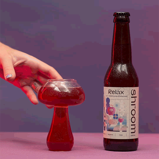 bottle of relax nad mushroom glass