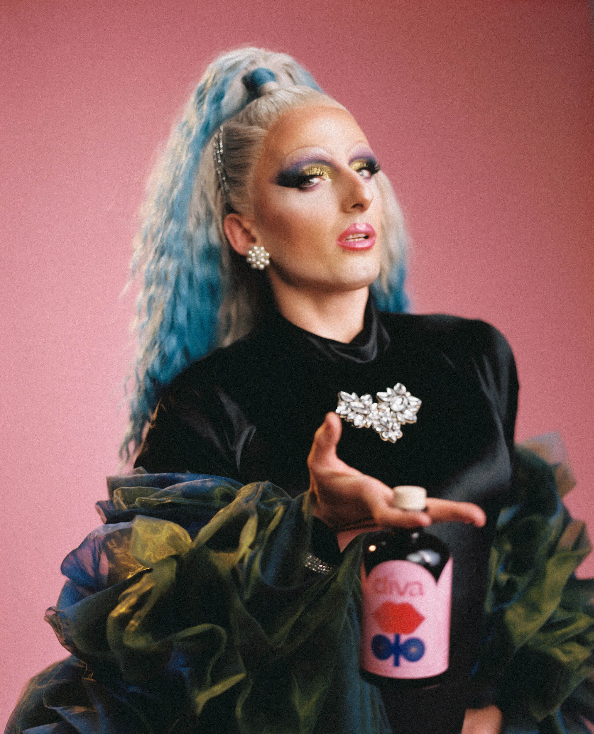 draqueen with diva bottle